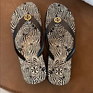 Tory Burch Black and Cream Zebra Flip Flops 9.5 inches long so probably a 7.5-8